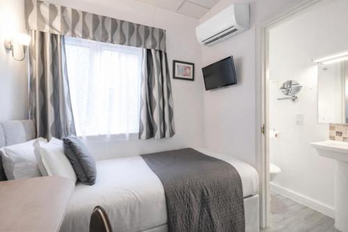 Habitación Individual Clásica del hotel The Melita. Foto 10