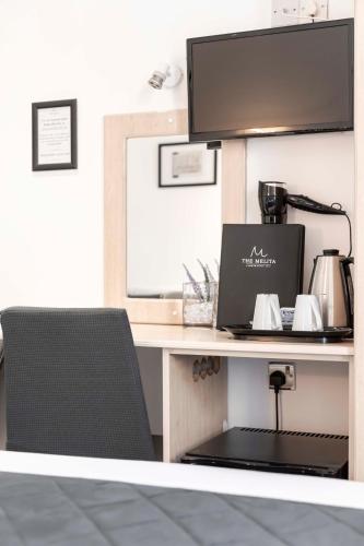 Habitación Familiar Clásica del hotel The Melita. Foto 5