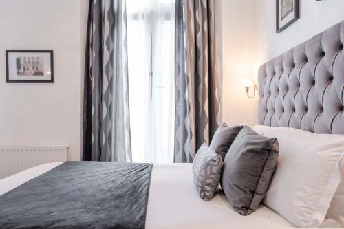 Habitación Familiar Clásica del hotel The Melita. Foto 7