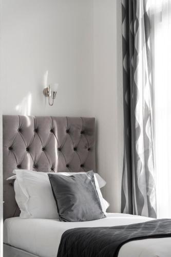 Habitación Familiar Clásica del hotel The Melita. Foto 9