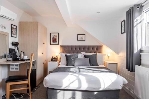 Habitación Familiar Clásica (4 personas) del hotel The Melita. Foto 15