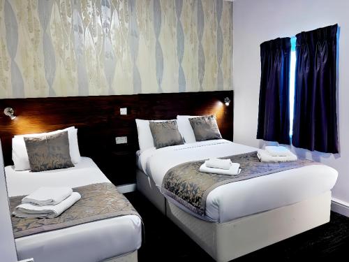 Habitación Triple del hotel Lidos. Foto 1