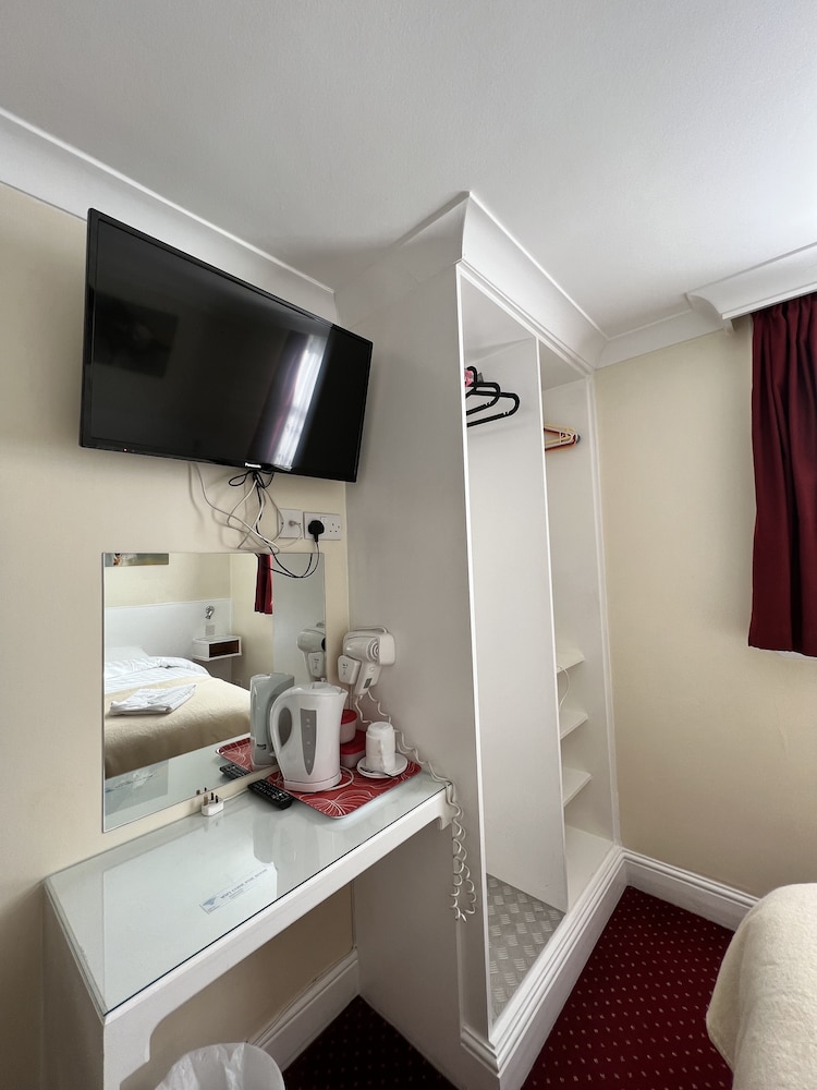 Habitación con 2 camas individuales del hotel Melbourne House. Foto 4