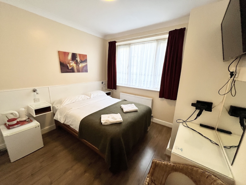 Habitación cuádruple del hotel Melbourne House