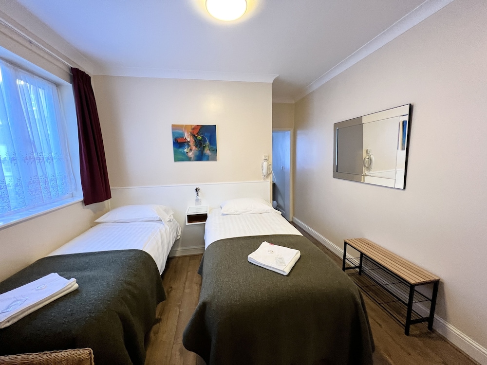 Habitación cuádruple del hotel Melbourne House. Foto 8