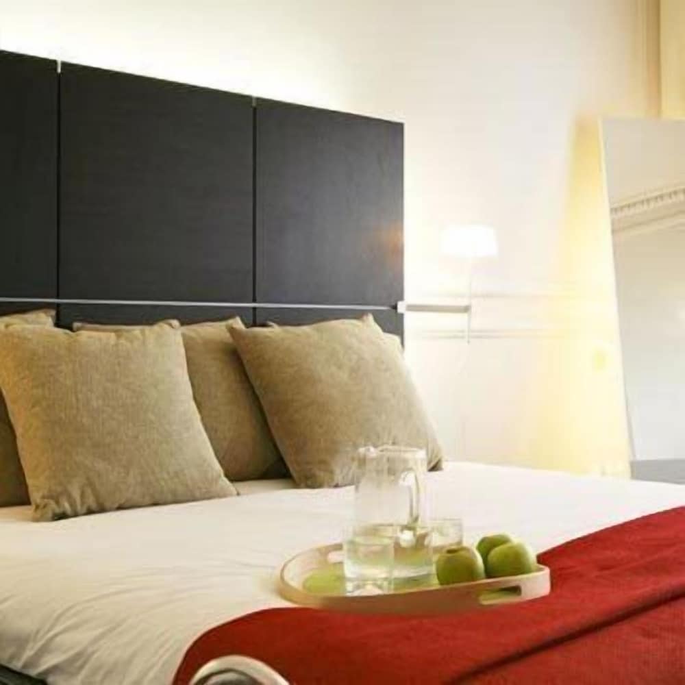 Habitación Deluxe del hotel The Sumner. Foto 1