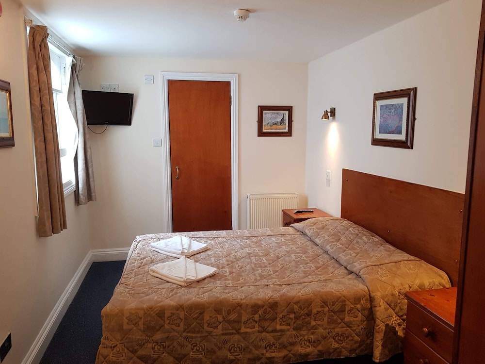 Habitación estándar doble, baño privado del hotel Normandie. Foto 1