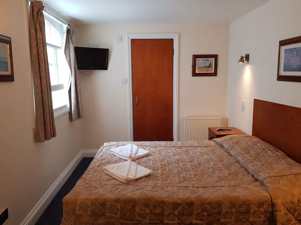 Habitación estándar doble, baño privado del hotel Normandie. Foto 2