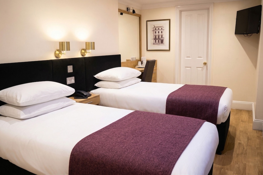 Habitación clásica con 2 camas individuales del hotel Athena. Foto 4