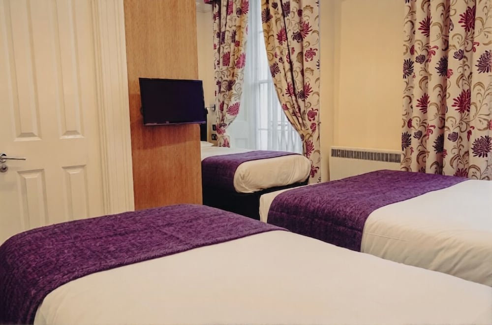 Habitación cuádruple clásica del hotel Athena. Foto 8