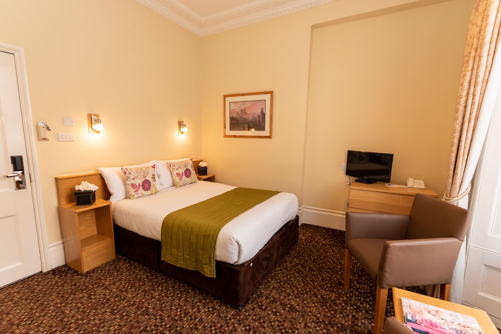 Habitación estándar doble del hotel The Darlington Hyde Park. Foto 1
