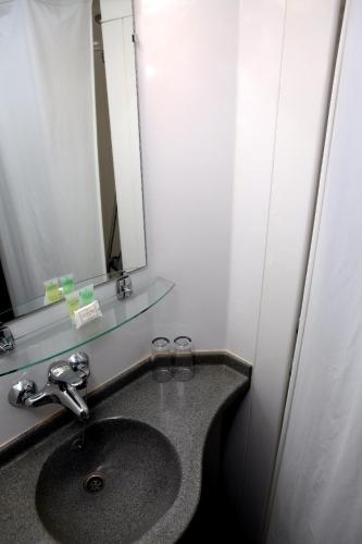Habitación Doble del hotel The Omega. Foto 6