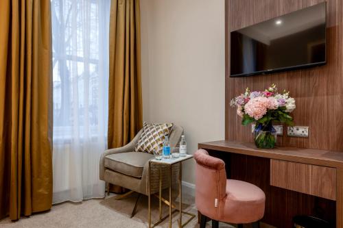 Habitación Triple del hotel Castleton. Foto 4