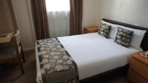 Habitación Doble del hotel Westpoint. Foto 11