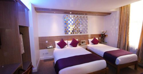 Habitación Triple del hotel Westpoint. Foto 6