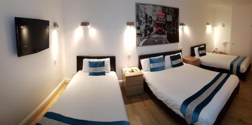 Habitación cuádruple del hotel Westpoint