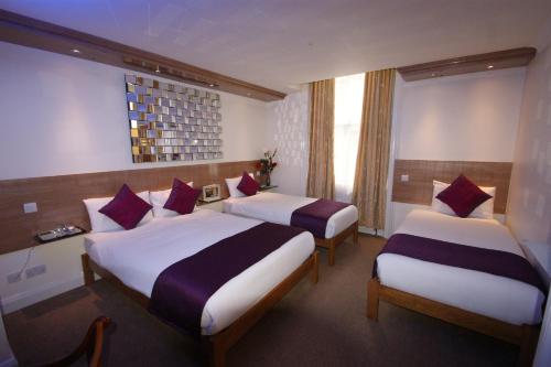 Habitación cuádruple del hotel Westpoint. Foto 10