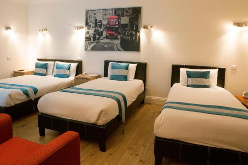 Habitación cuádruple del hotel Westpoint. Foto 11