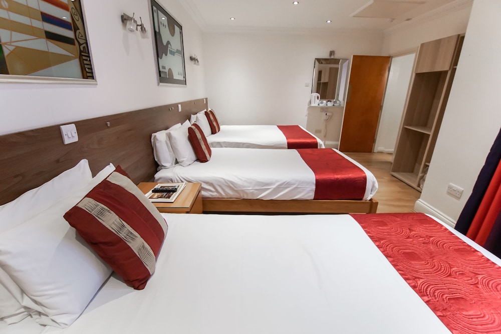 Habitación triple del hotel Abbey Court, Hyde Park Hotels. Foto 4