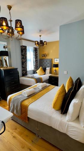 Habitación Triple Estándar del hotel Piccolino Hyde Park. Foto 1