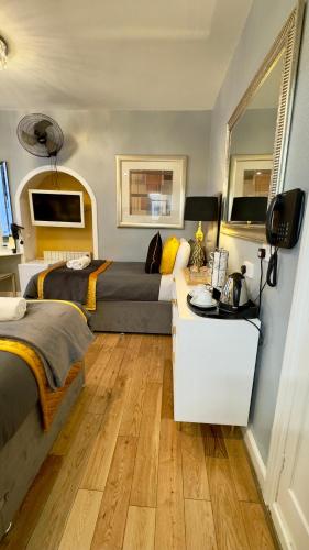 Habitación Cuádruple Estándar del hotel Piccolino Hyde Park. Foto 13