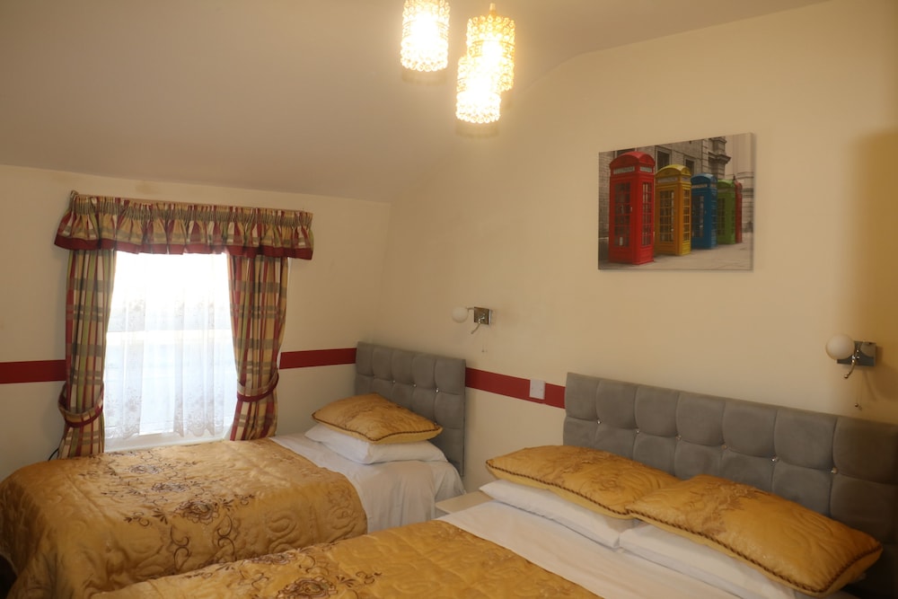 Habitación triple estándar del hotel Barry House. Foto 5