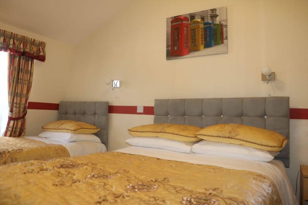 Habitación triple estándar del hotel Barry House. Foto 6