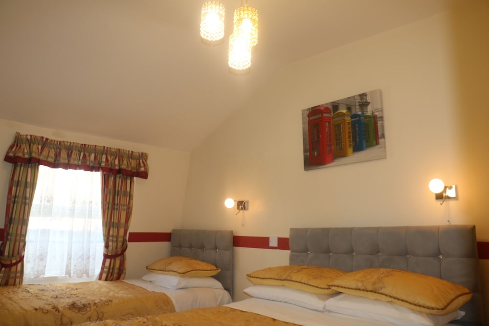 Habitación triple estándar del hotel Barry House. Foto 8