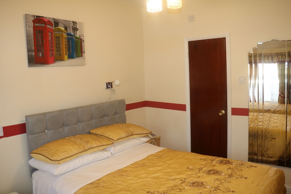 Habitación triple estándar del hotel Barry House. Foto 9