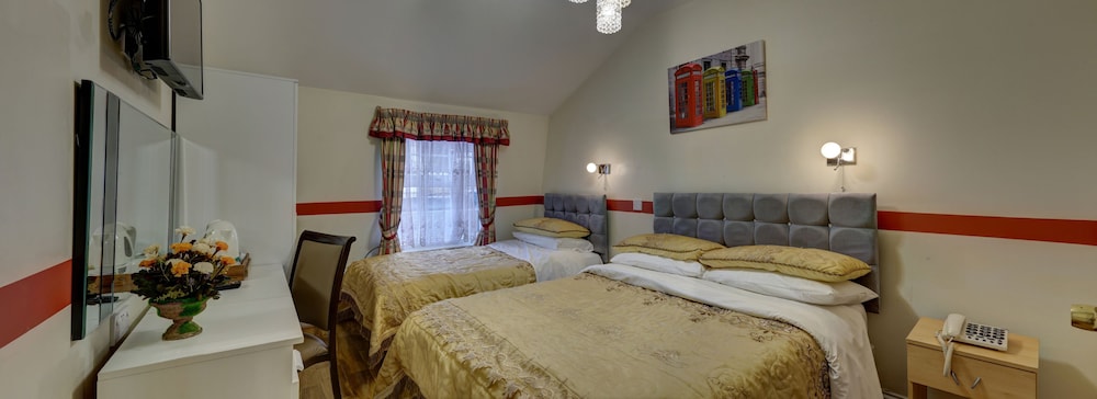 Habitación triple estándar del hotel Barry House. Foto 11