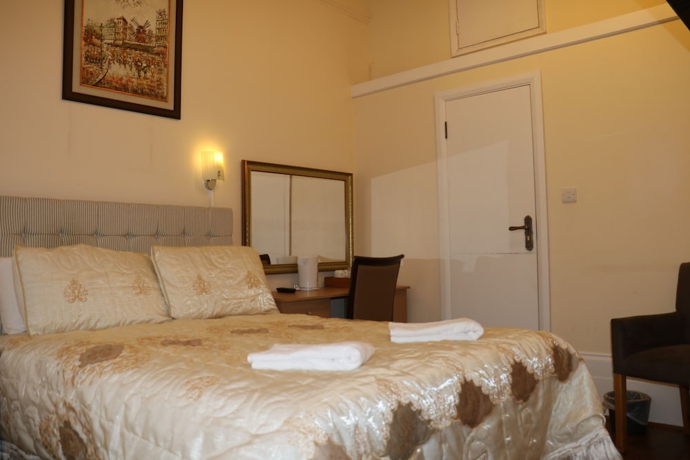 Habitación triple estándar del hotel Barry House. Foto 12