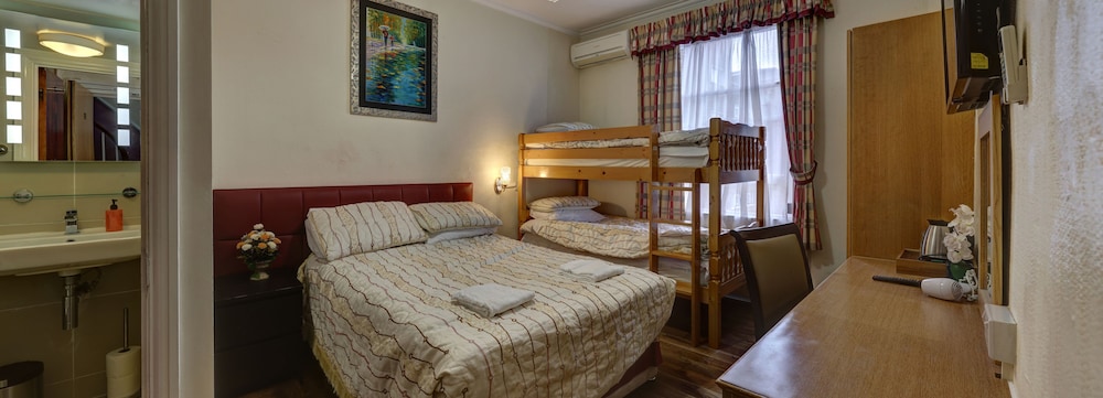 Habitación familiar (4 people) del hotel Barry House. Foto 5