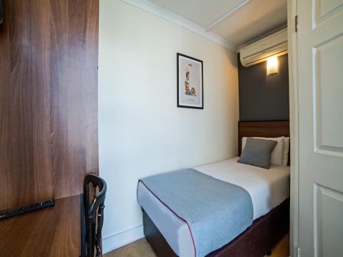 Habitación Individual Estándar del hotel Elysee Hydepark. Foto 1