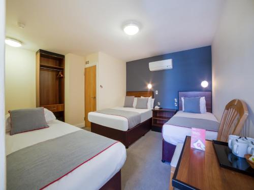 Habitación Cuádruple Deluxe del hotel Elysee Hydepark