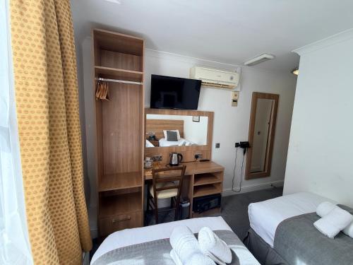 Habitación Doble Estándar - 2 camas del hotel Elysee Hydepark. Foto 8