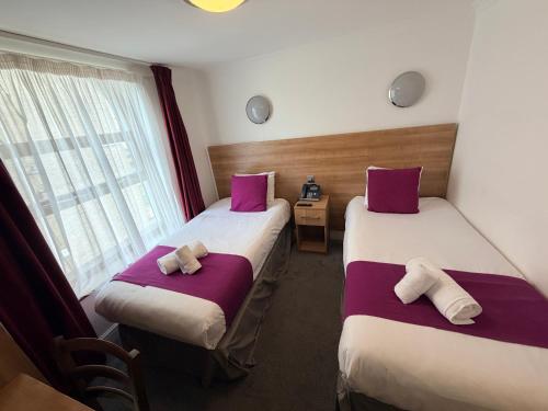 Habitación Doble Estándar - 2 camas del hotel Elysee Hydepark. Foto 9