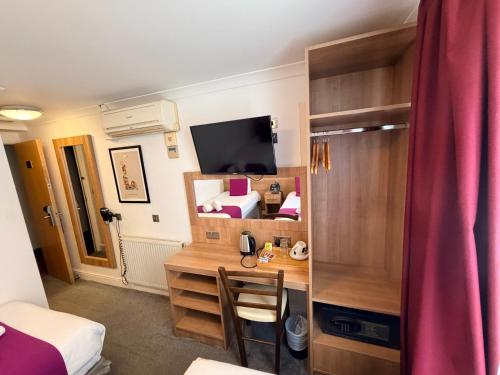 Habitación Doble Estándar - 2 camas del hotel Elysee Hydepark. Foto 11