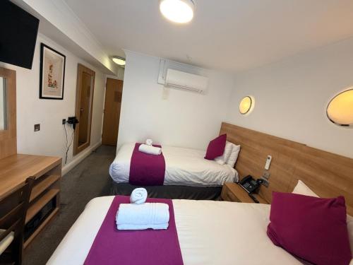 Habitación Doble Estándar - 2 camas del hotel Elysee Hydepark. Foto 13