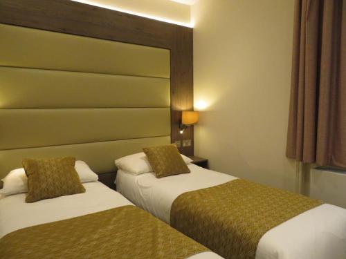 Habitación Doble - 2 camas del hotel Glendale Hyde Park. Foto 2