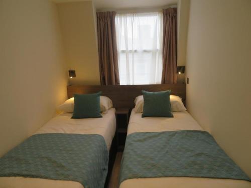 Habitación Doble - 2 camas del hotel Glendale Hyde Park. Foto 7