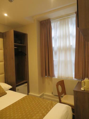 Habitación Doble del hotel Glendale Hyde Park. Foto 13