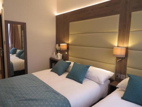 Habitación Triple del hotel Glendale Hyde Park