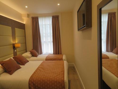 Habitación Triple del hotel Glendale Hyde Park. Foto 2