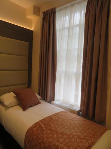 Habitación Triple del hotel Glendale Hyde Park. Foto 3