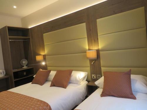 Habitación Triple del hotel Glendale Hyde Park. Foto 11