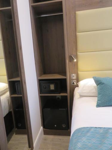 Habitación Triple del hotel Glendale Hyde Park. Foto 14