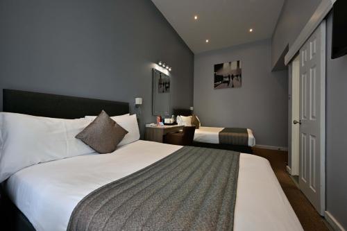 Habitación cuádruple del hotel Duke Of Leinster. Foto 2