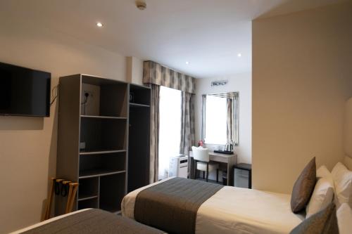 Habitación Triple del hotel Duke Of Leinster. Foto 7