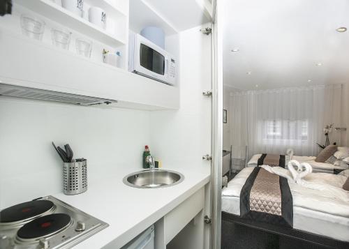 Estudio Triple del hotel MStay 39 Studios. Foto 1
