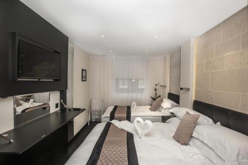 Estudio Triple del hotel MStay 39 Studios. Foto 2